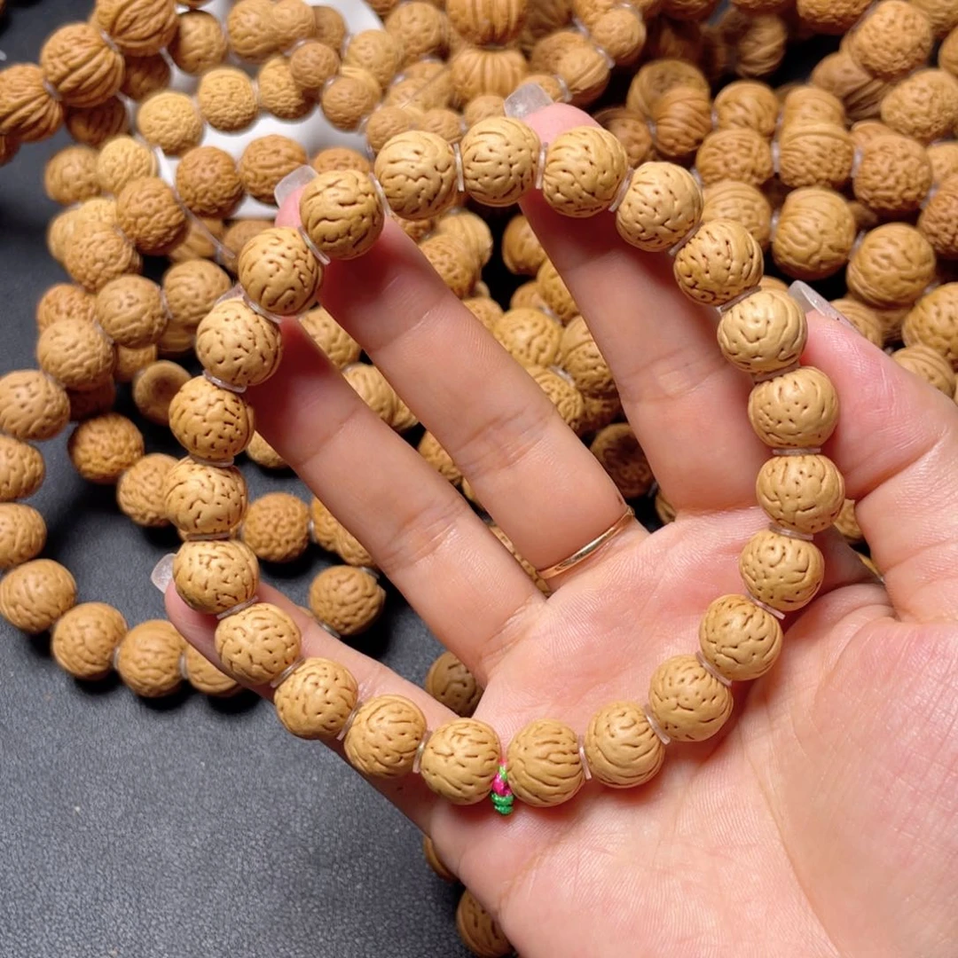 王***p桃核手串野生小奶豆