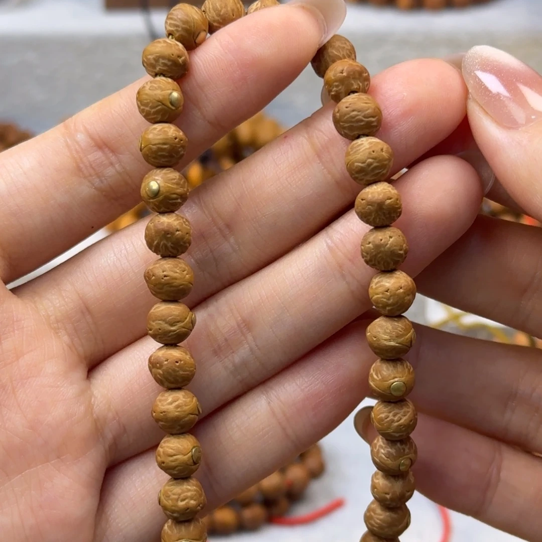 雪***豹凤眼菩提吊坠国产酸枣核精品大眼萌镶嵌款手持雪狼鲨豹