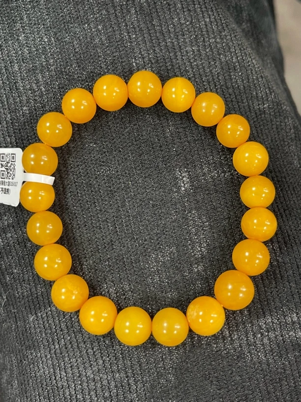 蜜蜡鸡油黄手串直径9mm