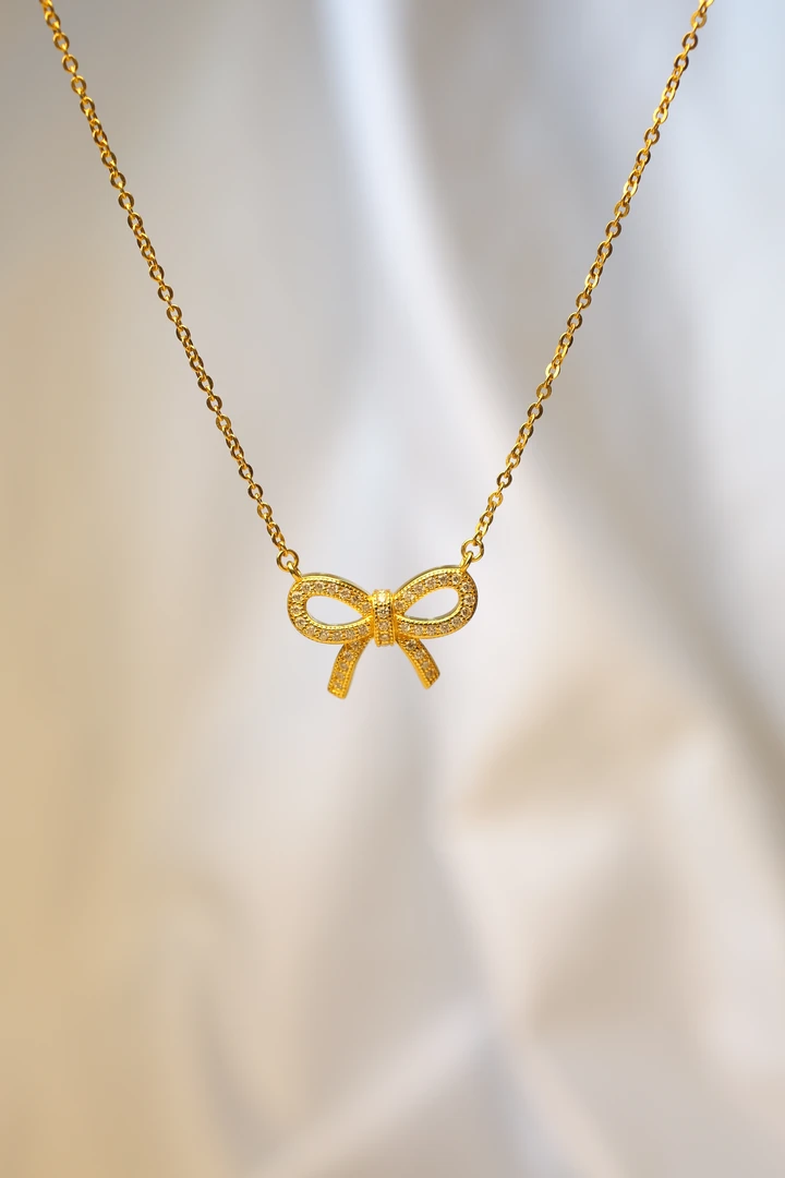 Pt铂金黄蝴蝶结点钻时尚套链