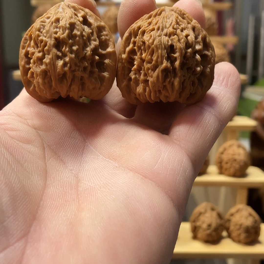 齐***昂吊坠桃核文玩核桃南将石