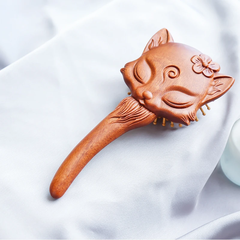 周广胜红檀香小狐狸气囊梳