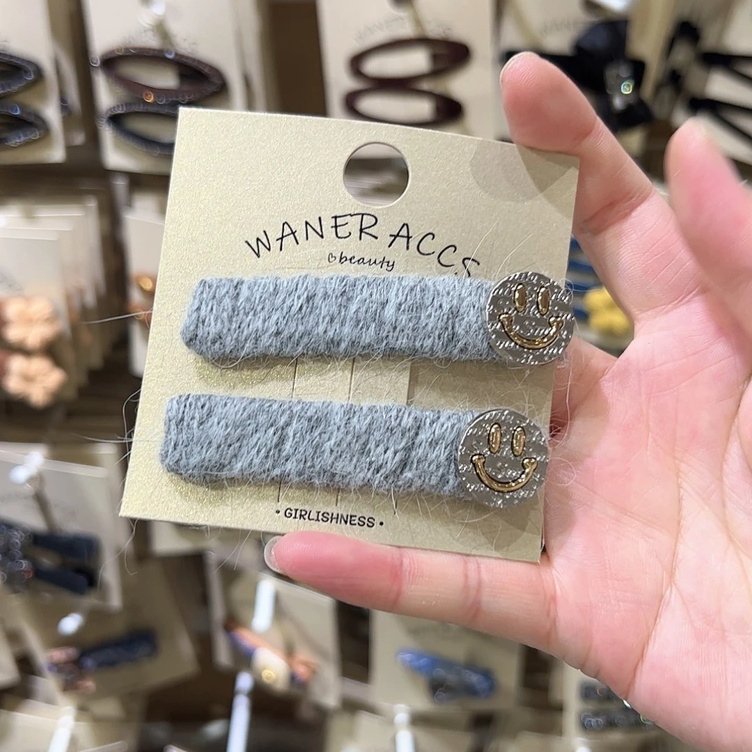 非金属布艺浅灰色笑脸拜拜夹