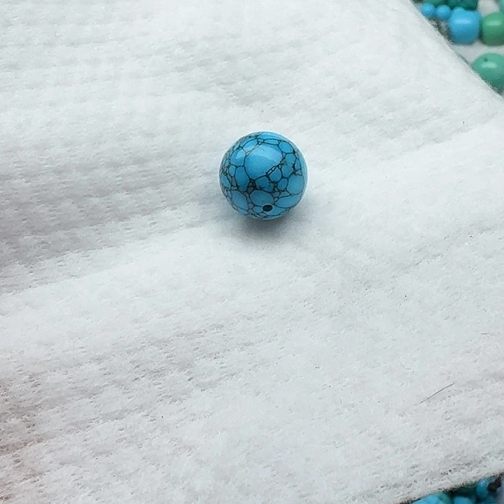 尺寸：14蓝网花纹圆珠一颗