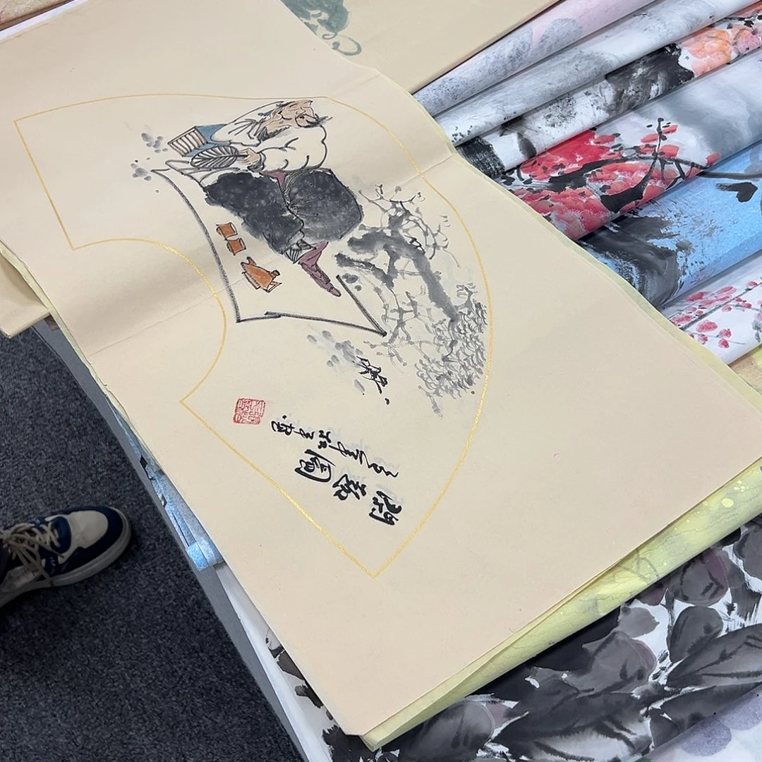 国画卖字画的小男孩
