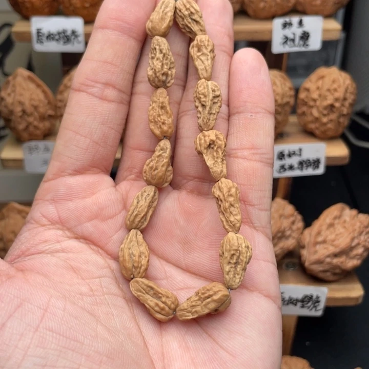 文玩核桃把件野生麻核桃瓜子手串0.9