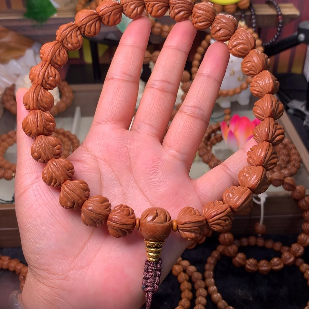 源***昱桃核吊坠红魔爆肚手持16