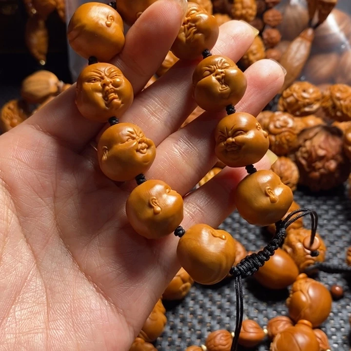 橄榄核吊坠w****u人生百态