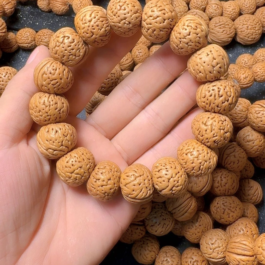 奥***姑吊坠桃核苹果园手串