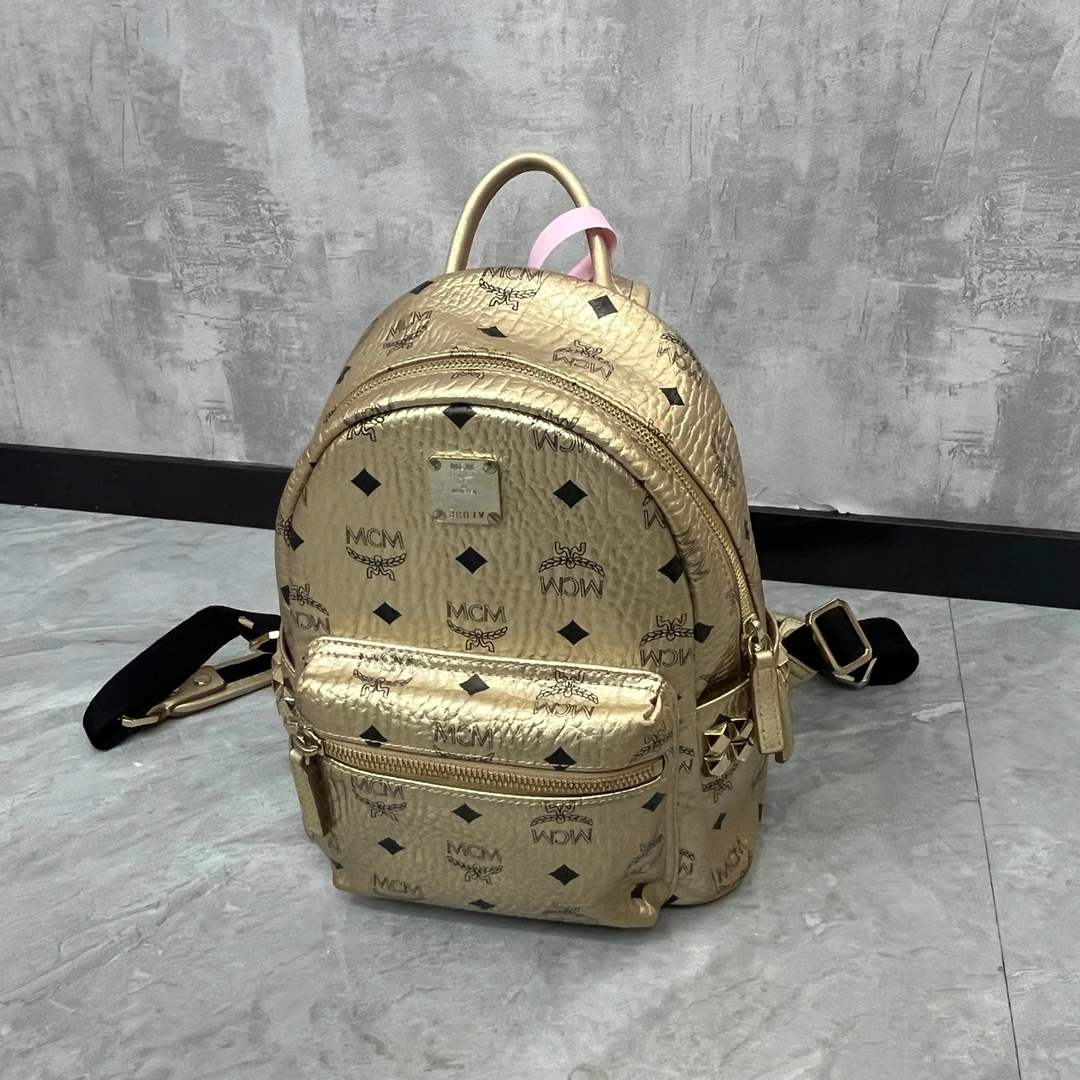 116 mcm香槟金小号双肩包 98新 864361