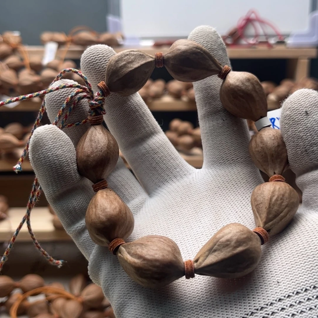 猛***牛吊坠橄榄核1828船埔铁核