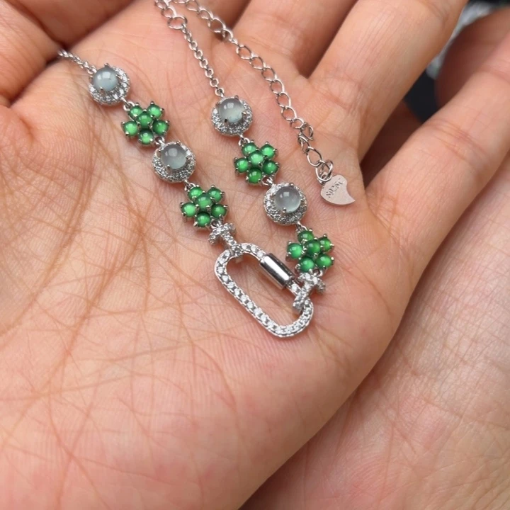 阳***N翡翠银S925镶嵌耳饰