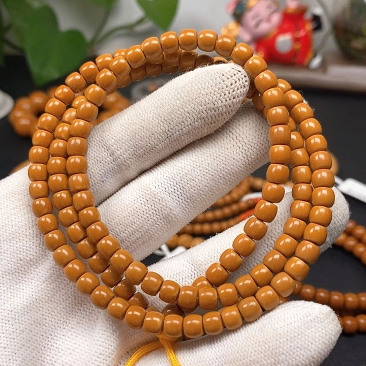 橄榄核手串5.5老挝核尖直切108微漏白