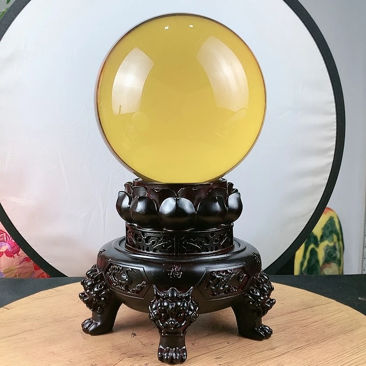 石材黄水晶球直径20带高档底座