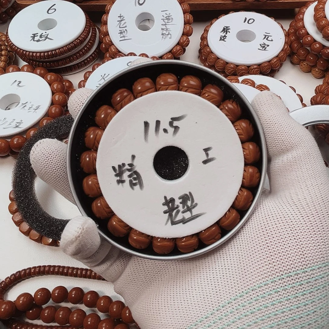 张***忌桃核手串桃核手串