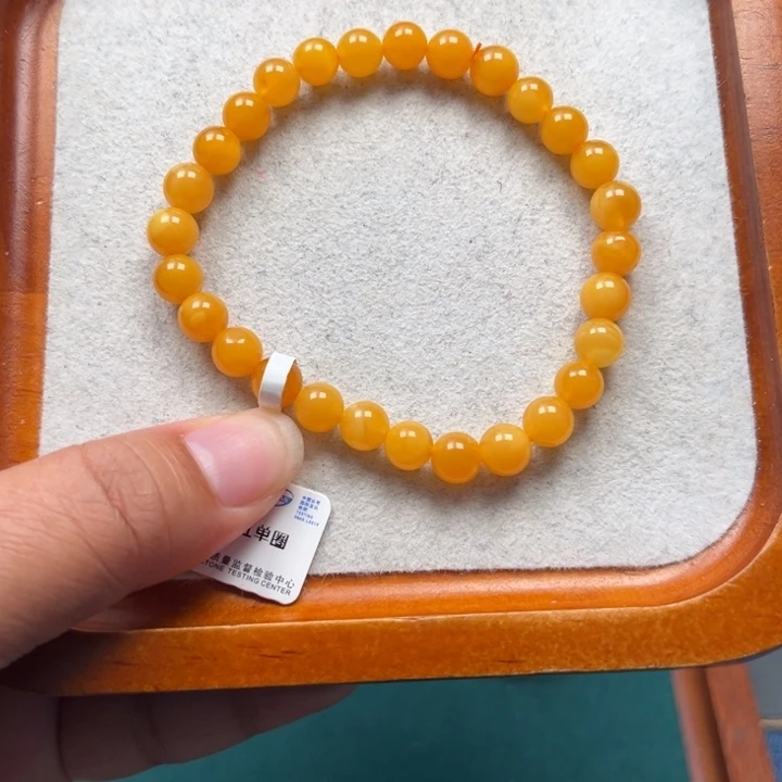 琥珀未镶嵌珠宝奇石M208号6.8+鸡油红