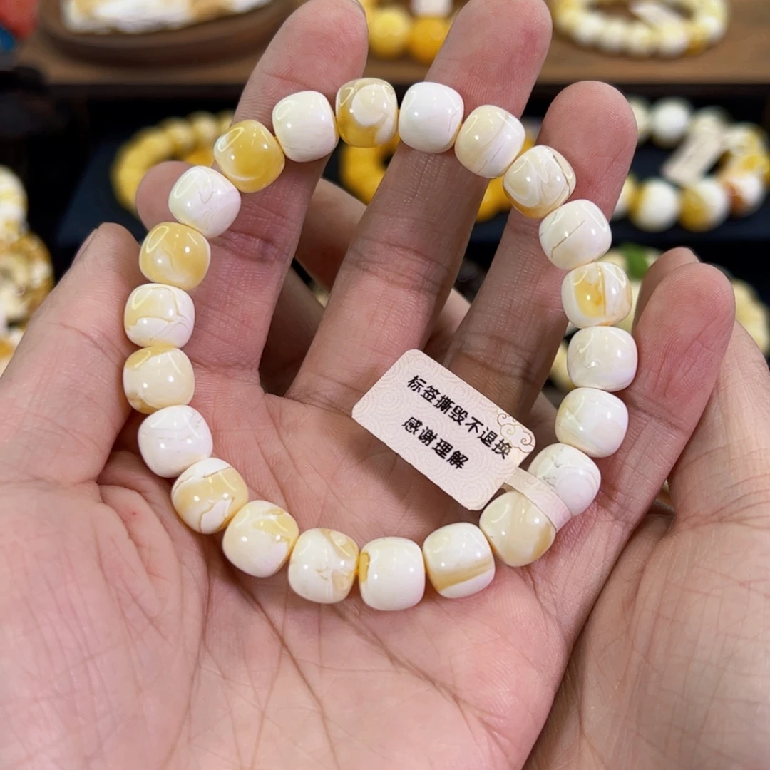 琥珀未镶嵌裸石同料橘金漆白溶洞拉丝老型手串