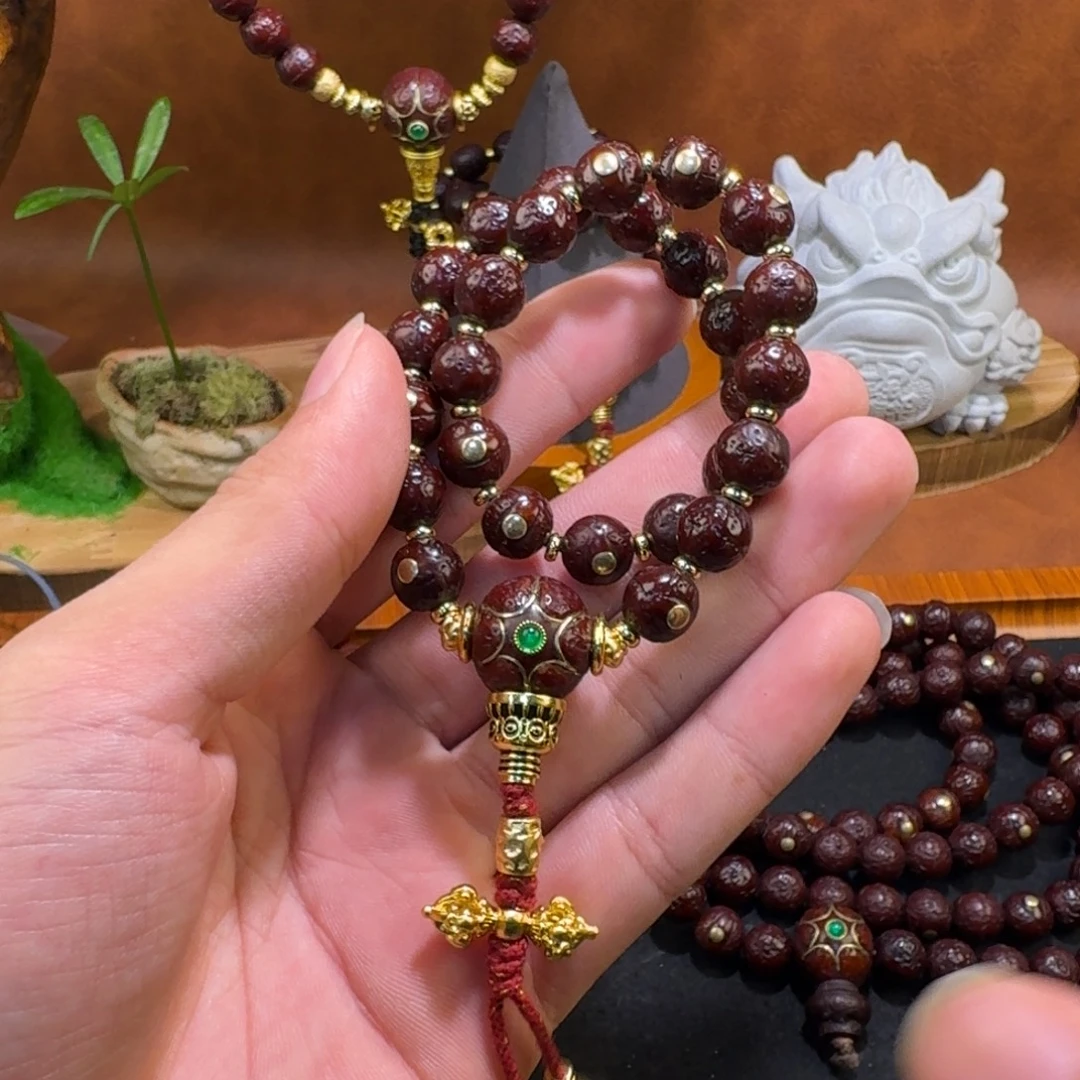 小***客凤眼菩提吊坠镶嵌满手持9+