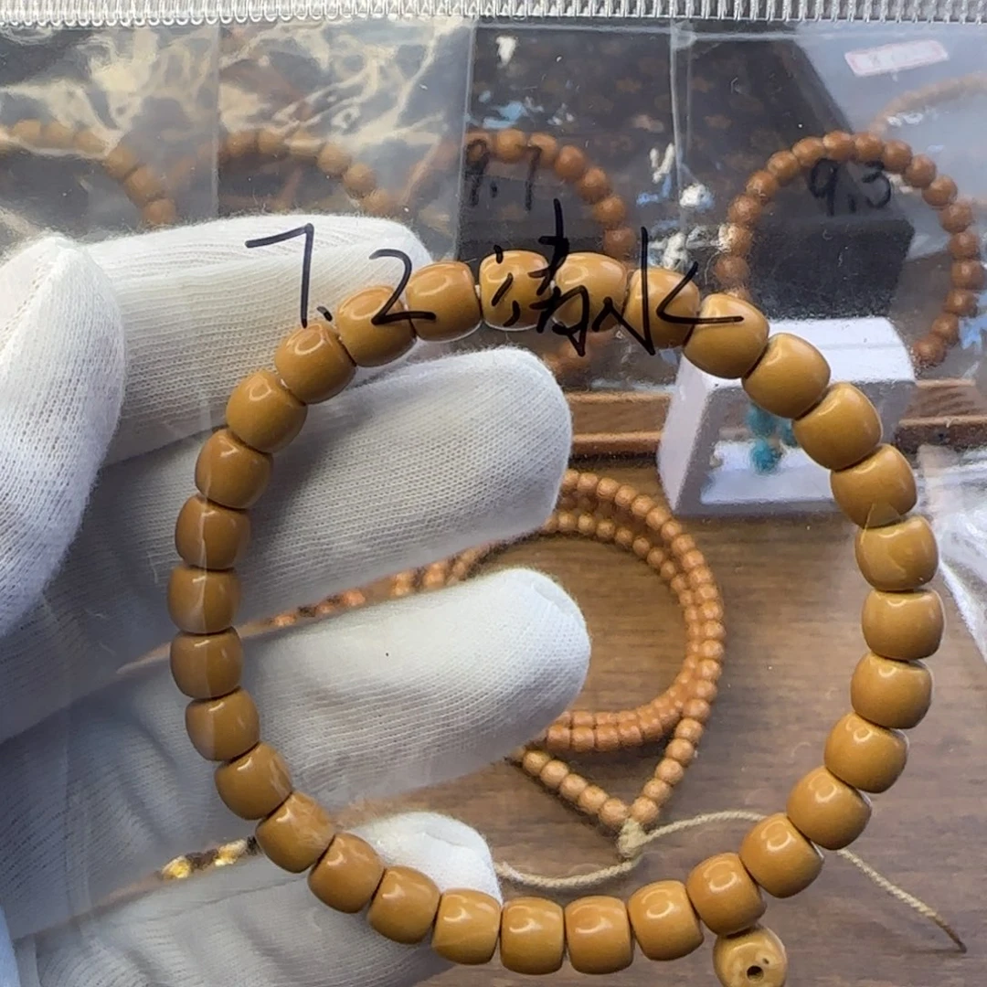 橄榄核吊坠少*7.2mm清水极限弧单圈单标