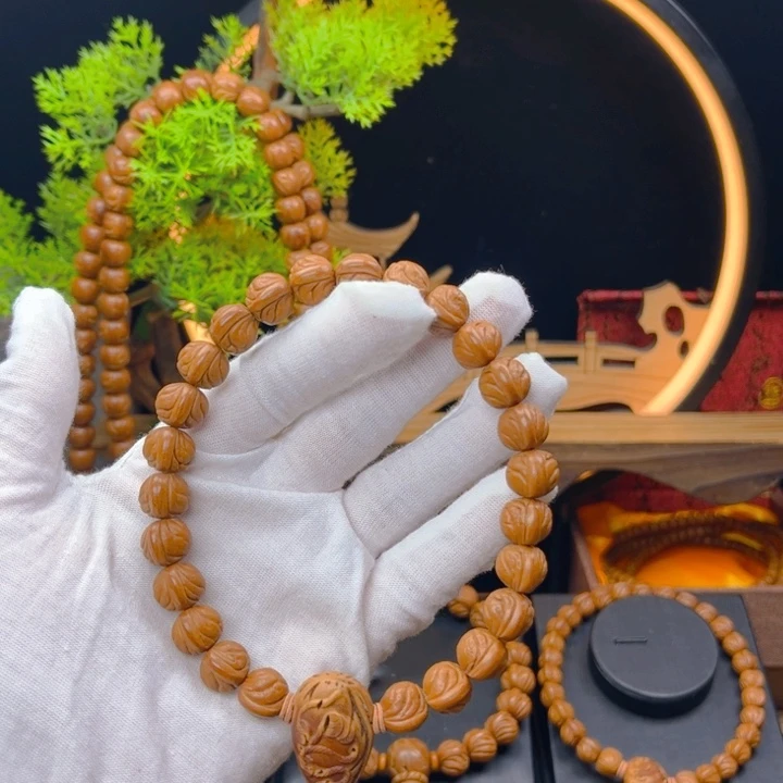 桃核吊坠夏***4野生桃核小龙纹手持