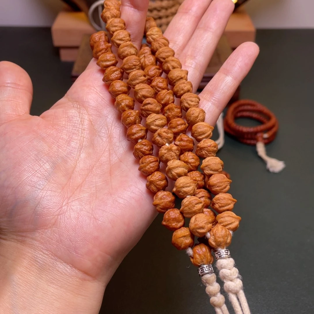 柏香籽/百香籽吊坠白牙横打手持