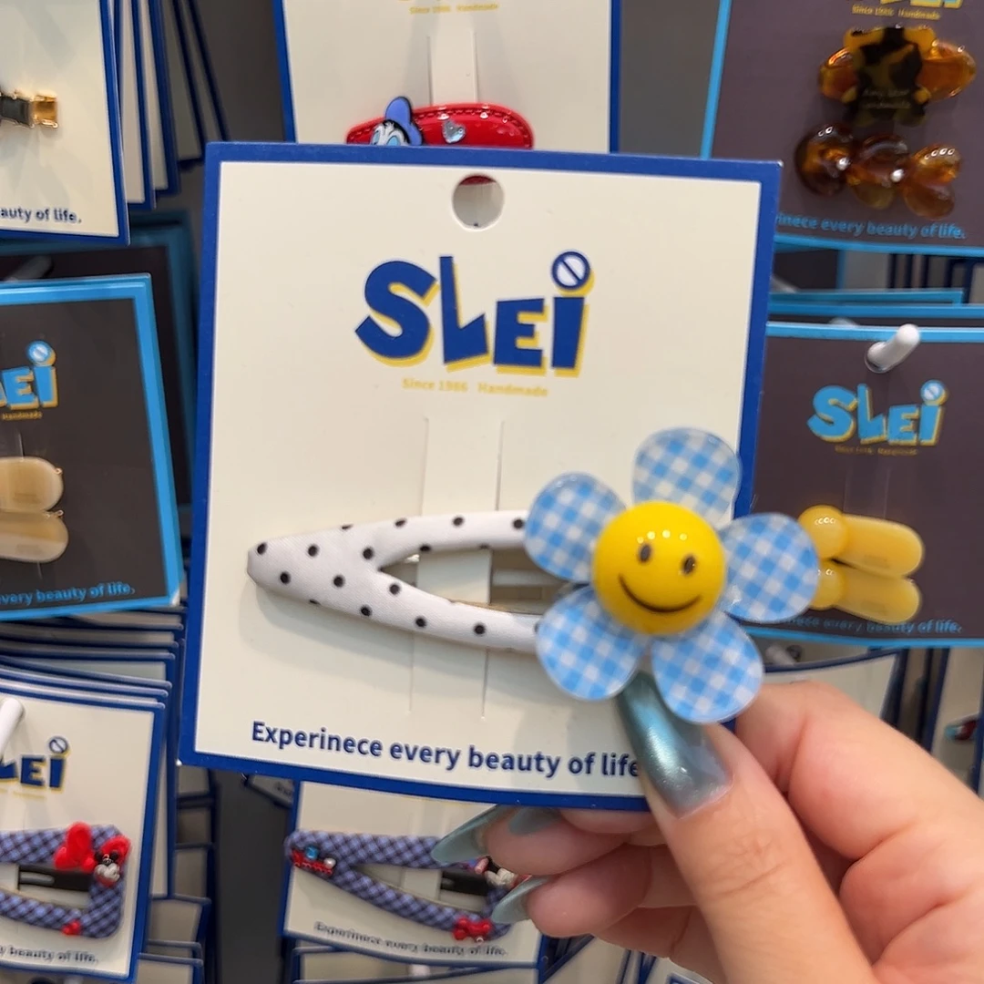 无非金属蓝色格子太阳花拜拜夹