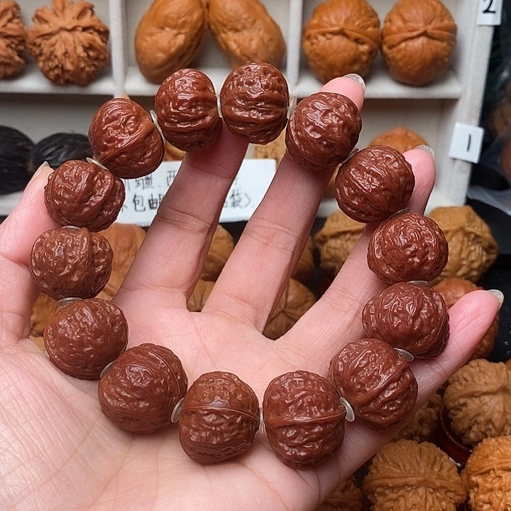 阳***光文玩核桃吊坠手串