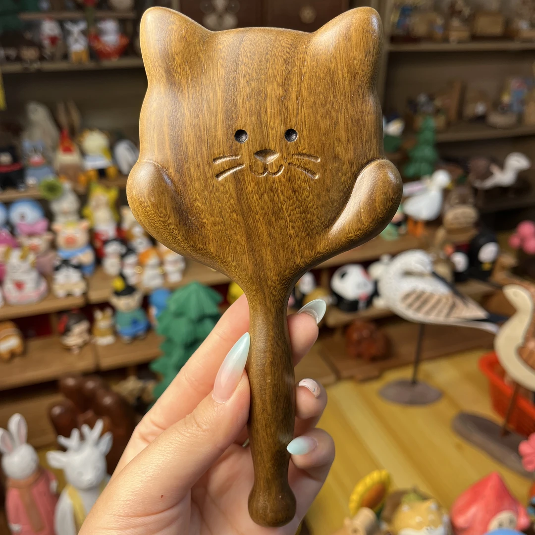 可爱猫咪气垫梳子蓬松颅顶气囊按摩头皮经络木梳家用长发梳