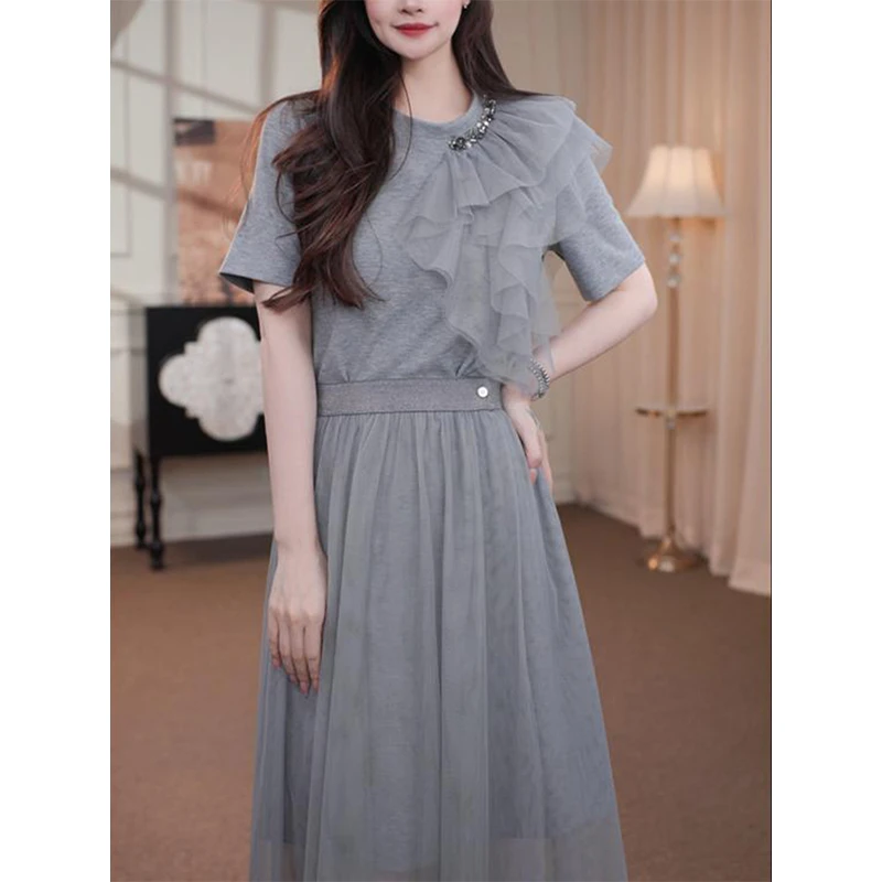 2025初夏穿搭荷叶边短袖连衣裙女新款法式拼接气质设计感小众裙子