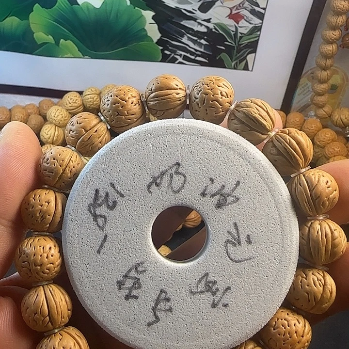 陈***岩桃核手串野生奶油元宝手持