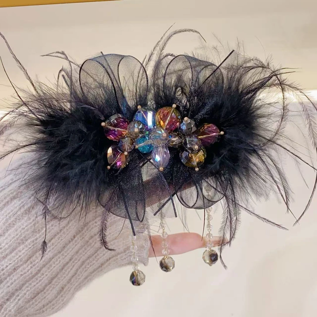 D86气质优雅黑色毛毛弹簧夹