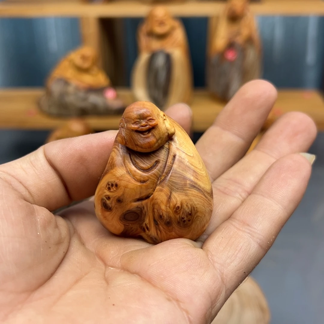 李***麦木崖柏木摆件手把件