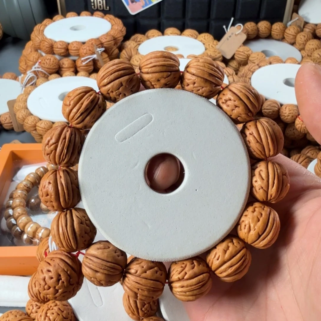 桃核手串悠***。195盘锦肌肉纹