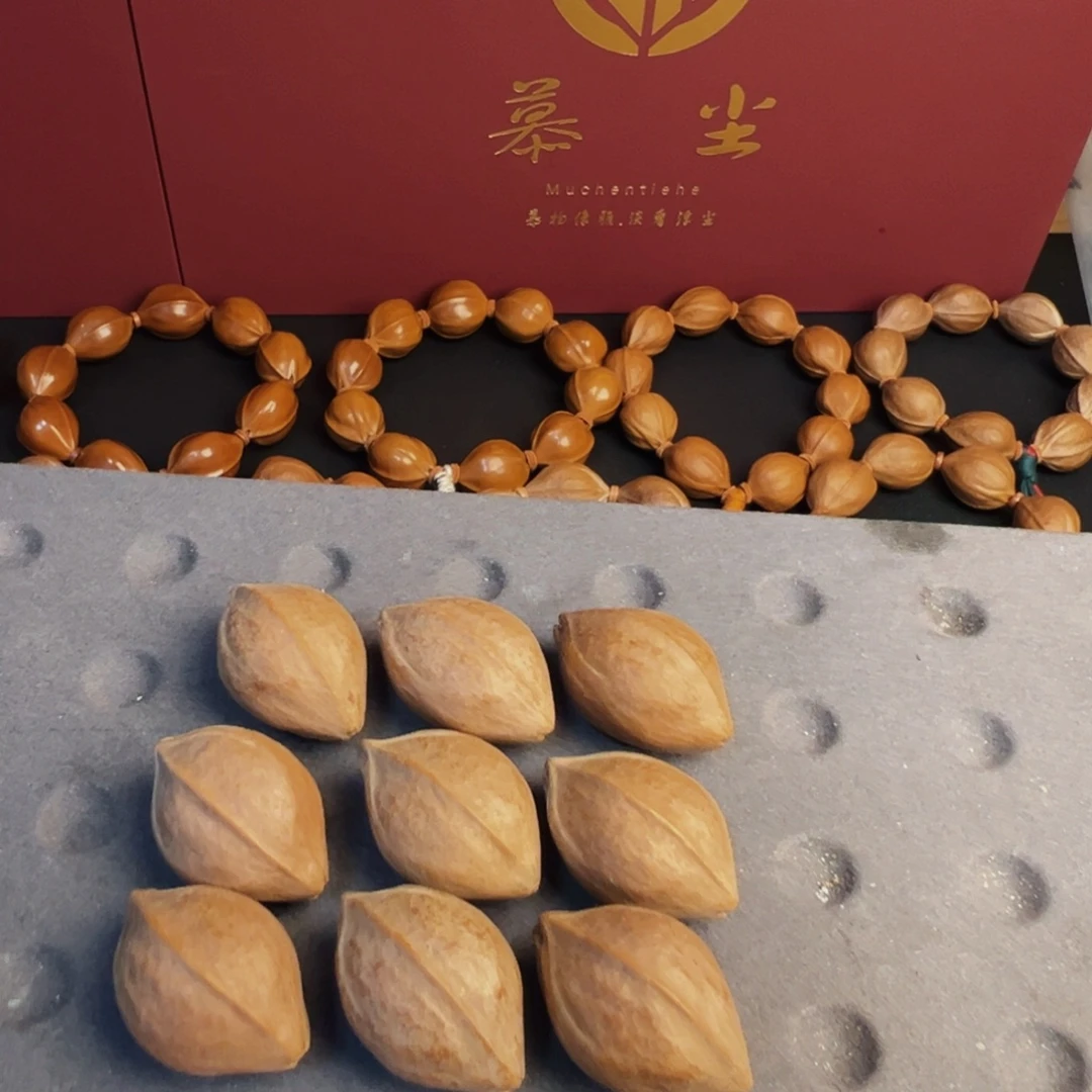 而***雄吊坠橄榄核1.2孔道梅林铁核20-30