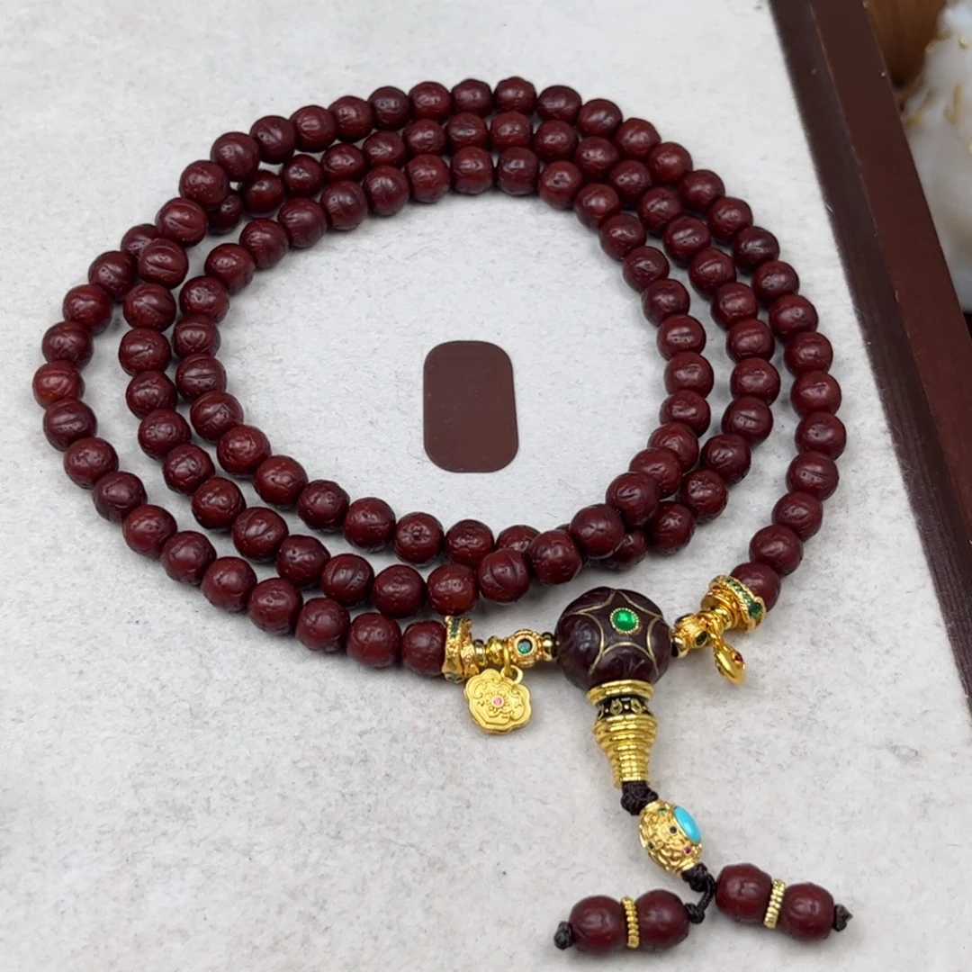 如***图凤眼菩提吊坠凤眼