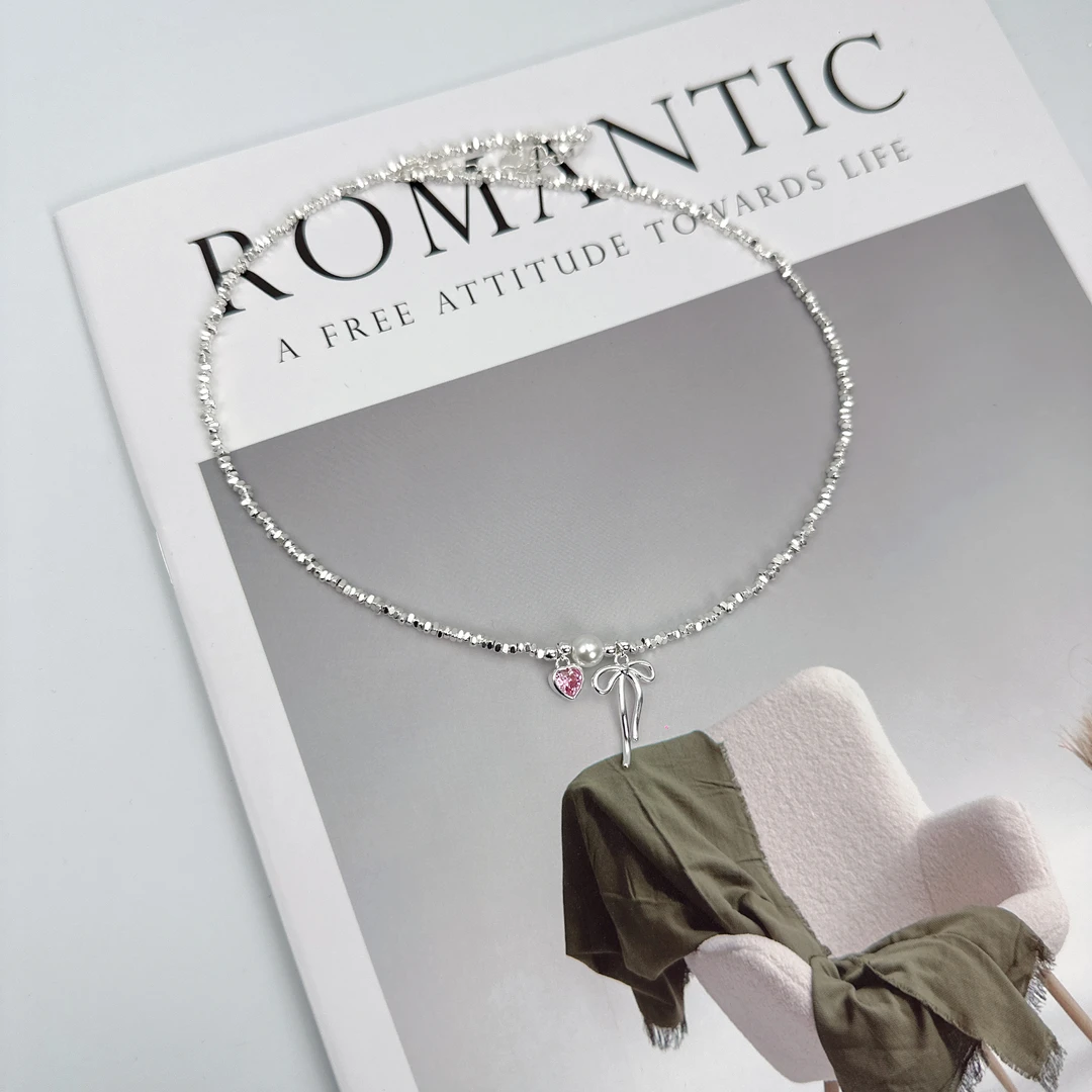 坠链均足银 银9999蝴蝶结碎银子项链女粉色爱心小珍珠锁骨链气质