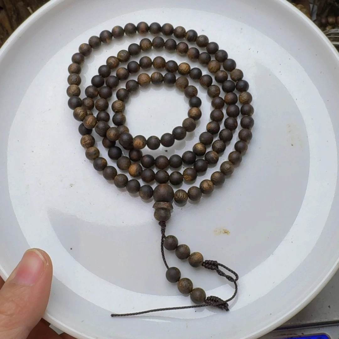 羣***一沉香沉香碎屑乌身圆叶沉浮0.6，16.7克