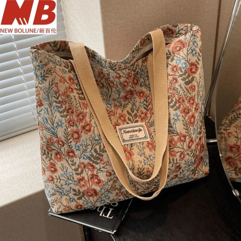 新百伦【万达撤柜】大容量帆布包包2025新款时尚小众ins女托特包