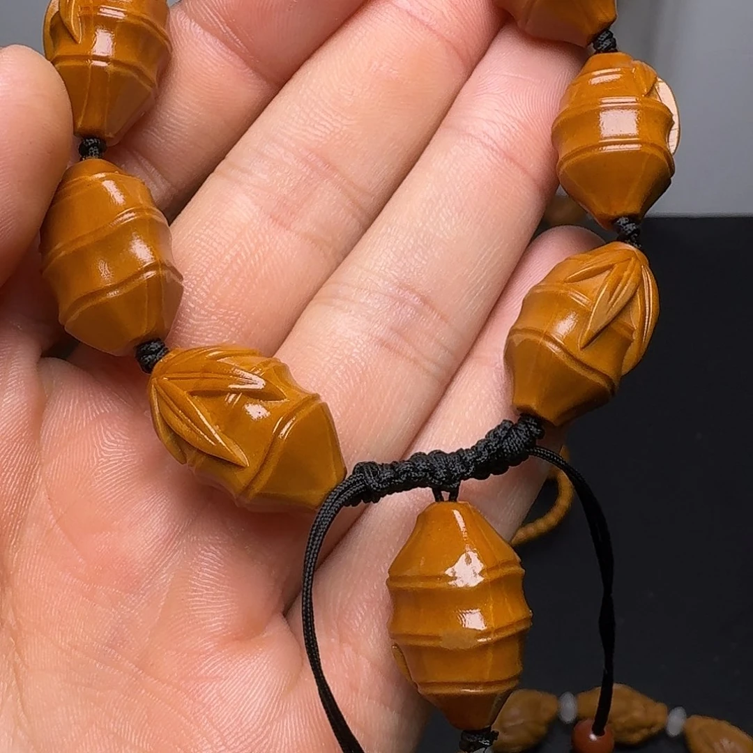 橄榄核手串飞轮海