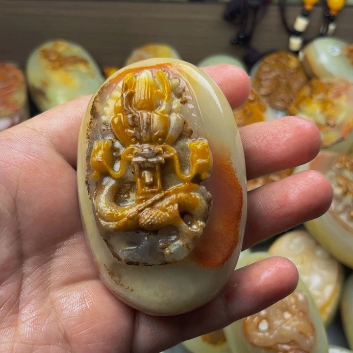 E***i石材方解石手把件