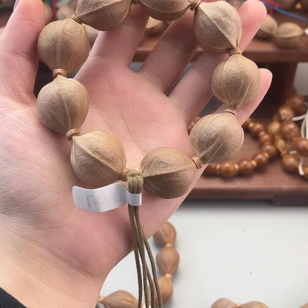 妇***师手串橄榄核鲨鱼背