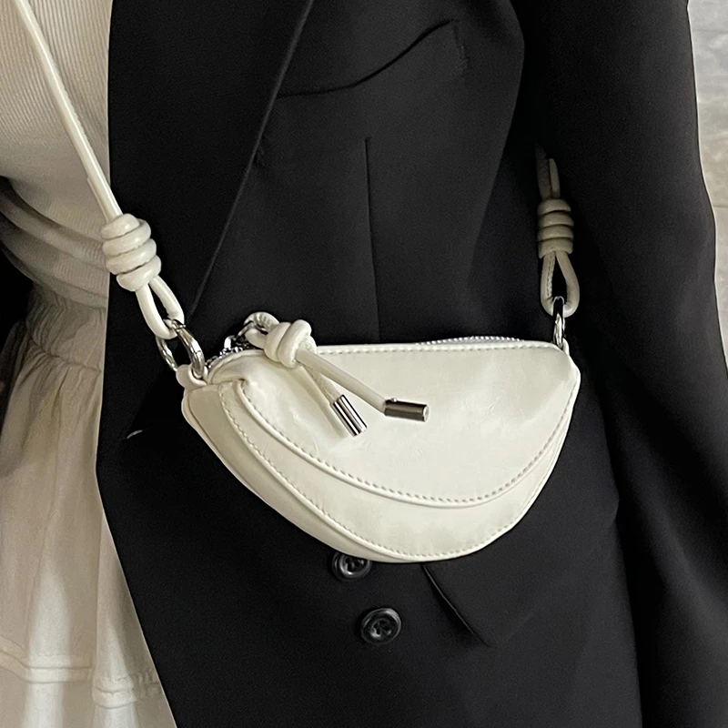 夏天超火小众包包女式2025新款时尚百搭斜挎包精致迷你单肩饺子包