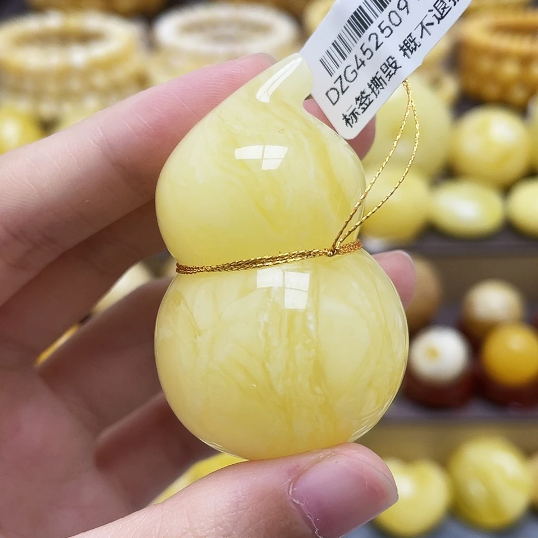 裸石琥珀未镶嵌49.5*25.4*31.2mm浓蜡虎皮妖花葫芦瑕