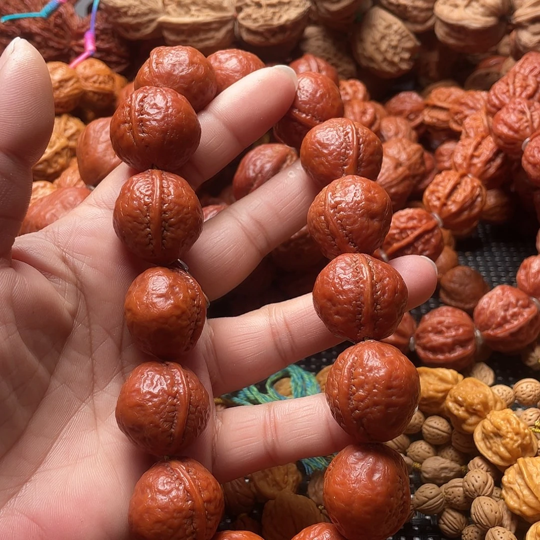 闲***生文玩核桃手串光头元宝