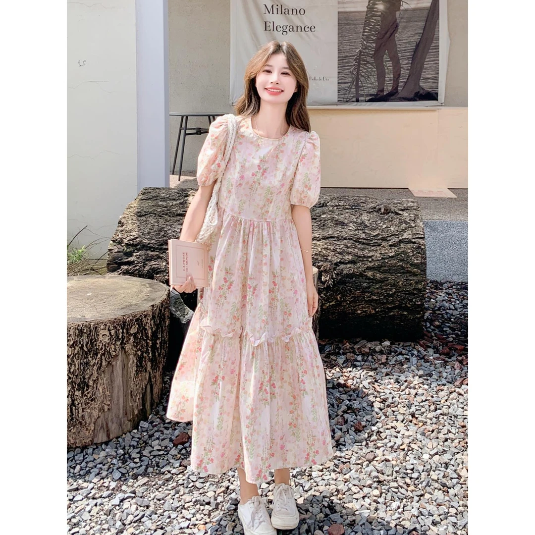 粉色印花连衣裙夏季女2025新款韩系泡泡袖木耳边宽松茶歇A字长裙