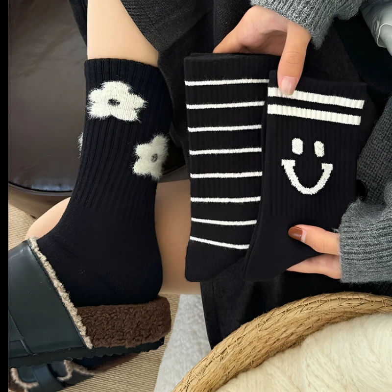 秋冬季黑色羊绒厚袜子女中筒袜保暖甜美小花ins潮网红款条纹长袜