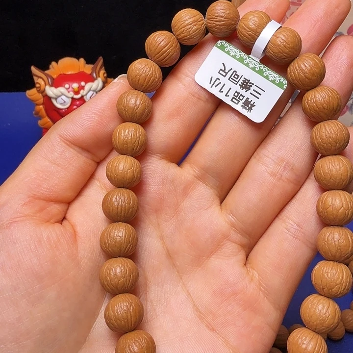 老***王吊坠猴头核桃凤羽