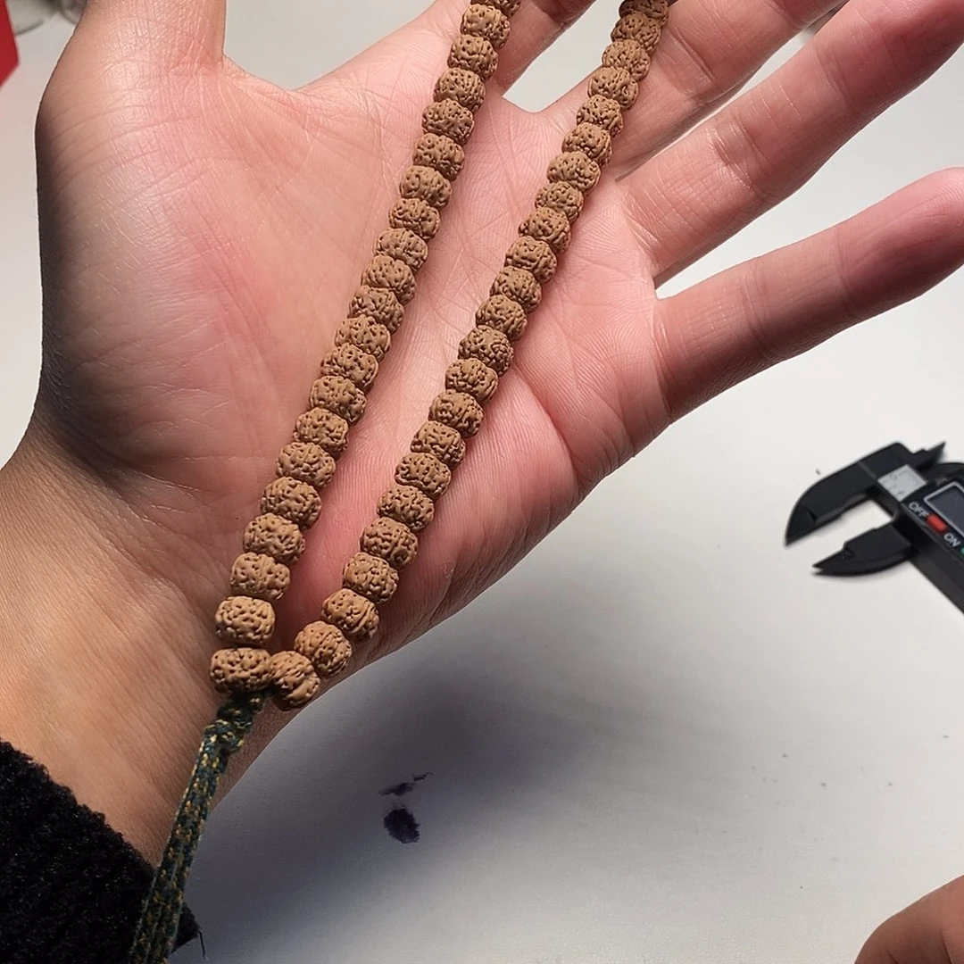 我***哥手串金刚菩提梅花9mm龙切大手持