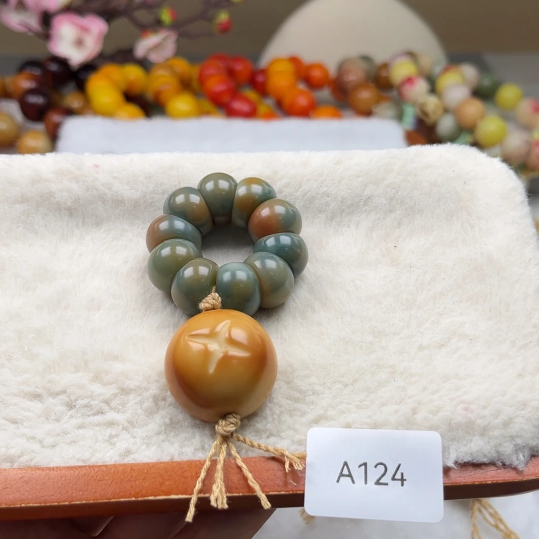 白玉菩提吊坠瑕a124蒜瓣手捻13-14m