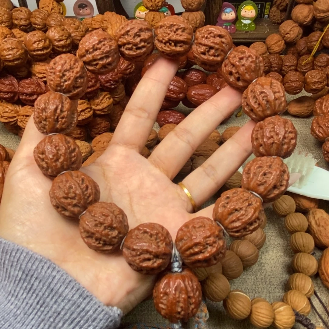 文玩核桃吊坠珊瑚手持文玩核桃